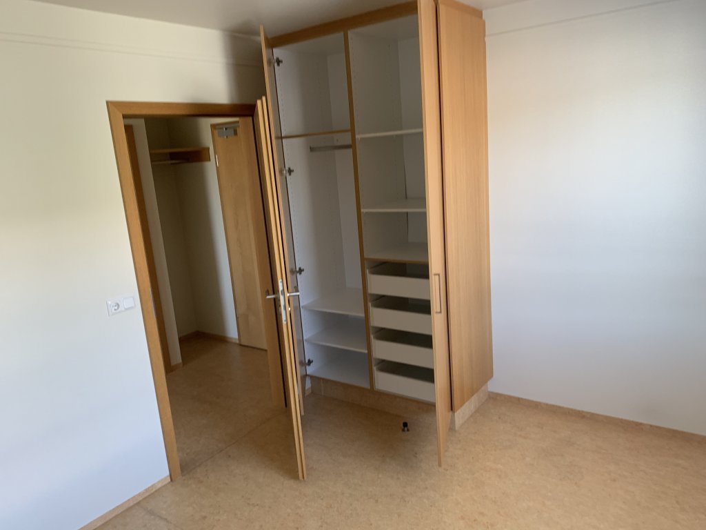 Wardrobe in the smaller bedroom in two-bedroom apartments