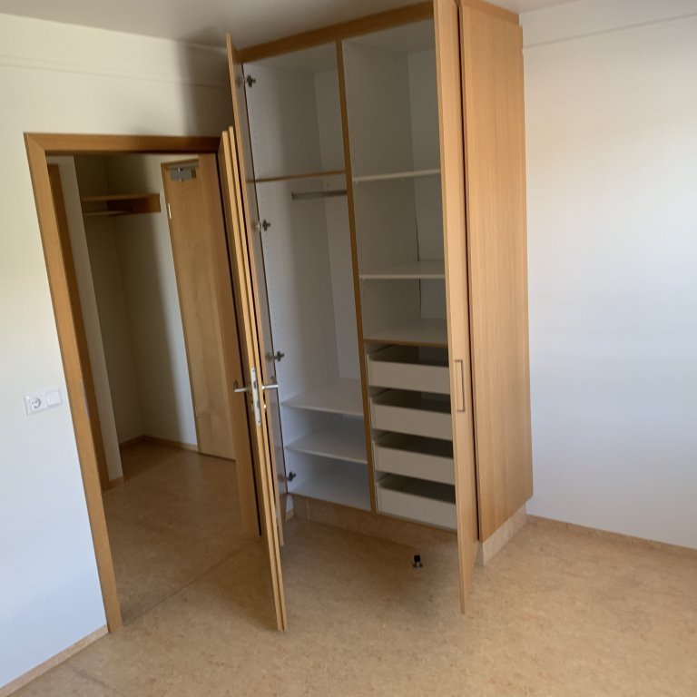 Wardrobe in the smaller bedroom in two-bedroom apartments